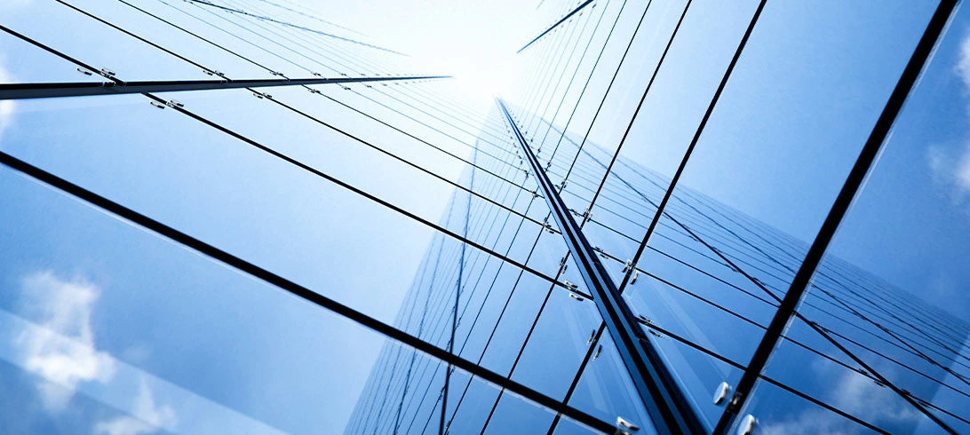 Vertical shot of a tall, reflective building